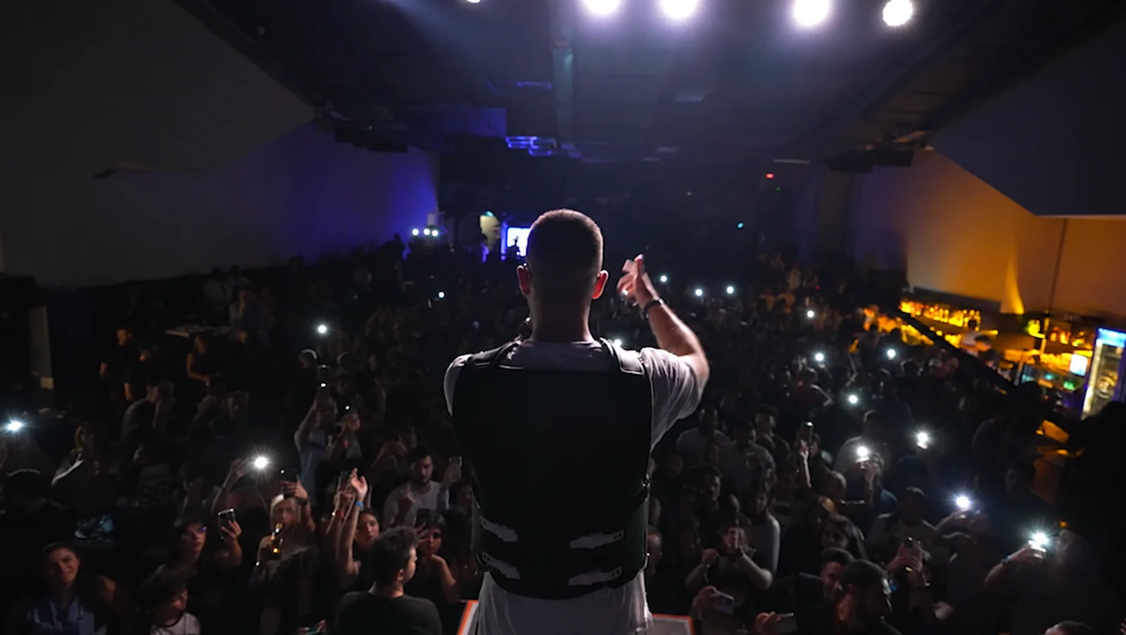 View from the stage toward the audience and phone lights